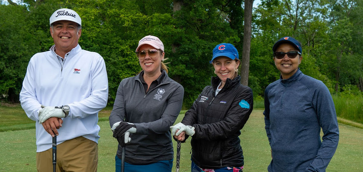 Four golfers at Ravinia's Magic of Music fundraising event